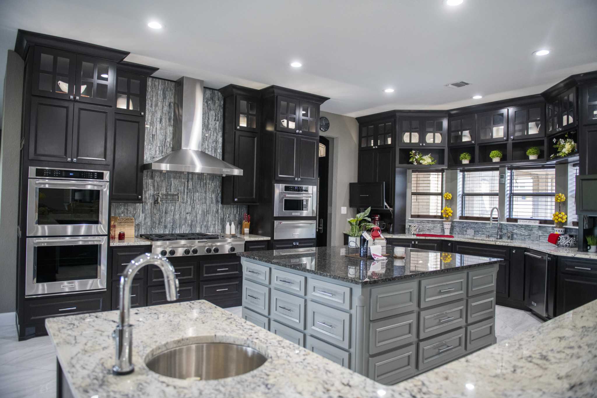 Greg and Vanessa Douglas incorporated some of the latest trends in kitchen cabinets when they renovated their kitchen in their home in Garden Ridge.